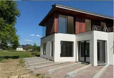 Maison contemporaine en ossature bois et bardage
